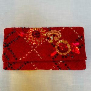 Red Beaded Eye Catching Clutch-Red & Multi Colors